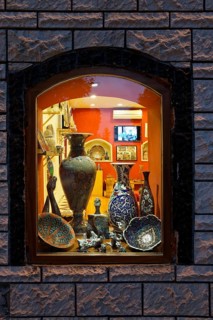 Porcelain Vases and cats in a shop window