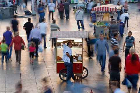 Street vendors with wagons selling pastries