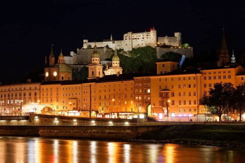 View over the Salzach river with the tower of the Town Hall