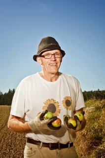 Man with apples on the field