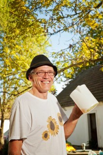 Man with freshly squeezed apple juice