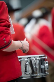 Drummer of the Weissensee marching band in traditional costume performing at the Naturparkfest festival in Techendorf