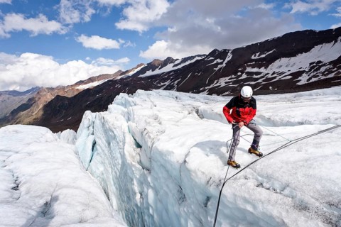 Alpinist at a crevasse rescue on Zufallferner glacier in the Martelltal valley