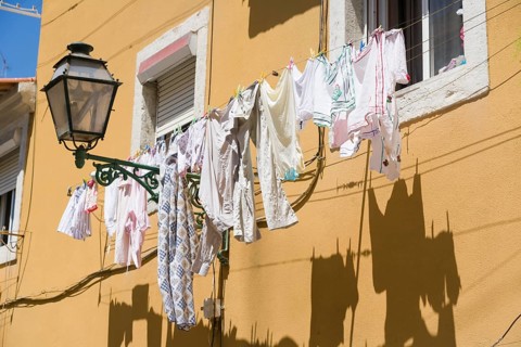 Washing line in front of house