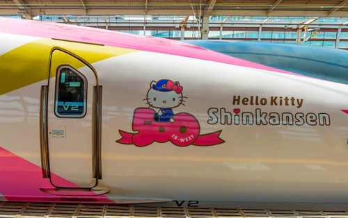 Hello Kitty advertising on high speed train Shinkansen on platform