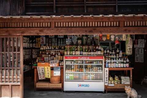 Shop sells various bottles of sake