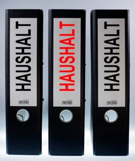 Three ring binders labelled 'HAUSHALT'
