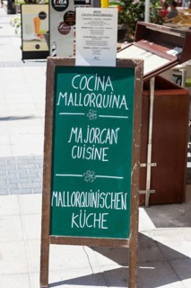 Sign of a restaurant serving typical Majorcan cuisine