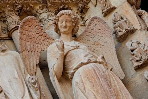Angel on the left main portal
