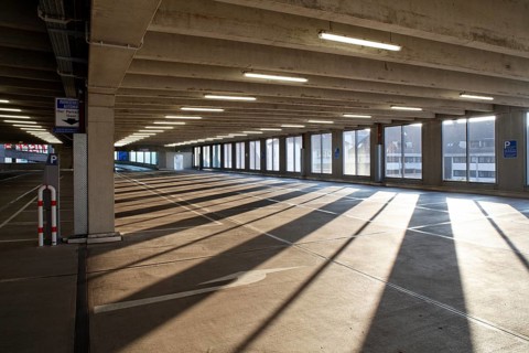 Empty parking garage of the Hieber company in the early morning