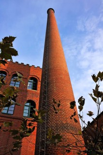 Brick chimney from the former brewery of Sudhaus beside the Kunsthalle Wuerth art gallery