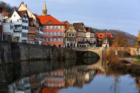 Row of old houses along the bank wall of the Kocher River