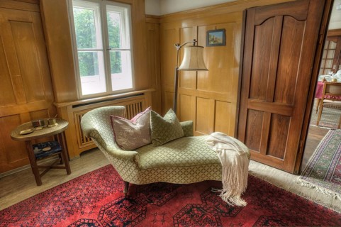 Chaise longue in the living room of a factory owner