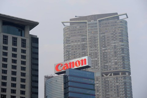 Skyscrapers and a Canon logo