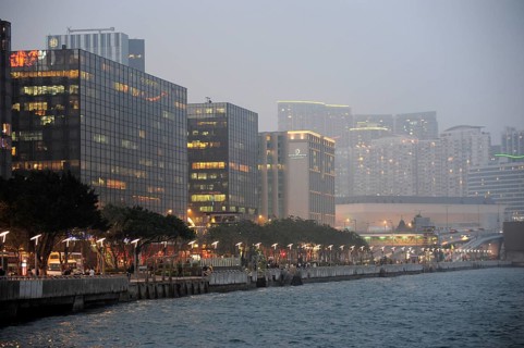 View of skyscrapers and Victoria Harbour in the evening