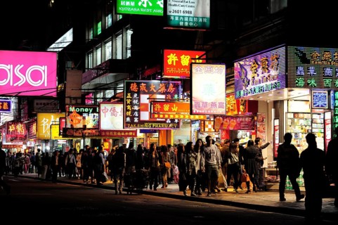 Shops and neon signs in a street