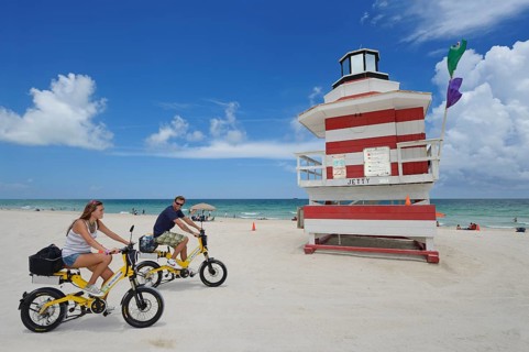 Couple riding electric bicycles