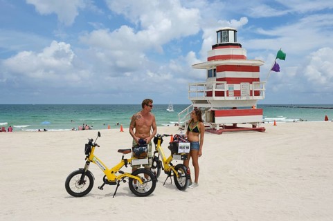 Couple riding electric bicycles