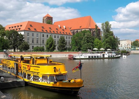 Excursion boat in front of church Maria auf dem Sande and monastery of the Augustinian canons