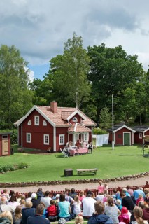 Viewers watching a scene from the children's book 'Emil of Lonneberga' by children's author Astrid Lindgren