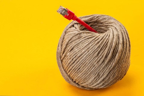 A roll of twine and ethernet cable