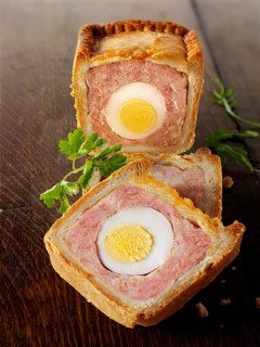 Traditional pork pie with an egg in the middle