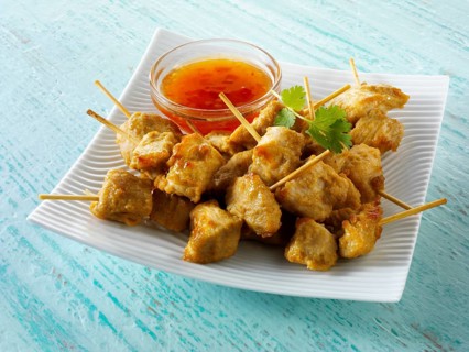 Traditional Oriental satay with chilli dipping sauce