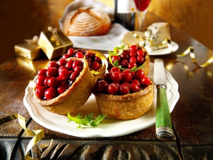 Traditional cranberry topped pork pies