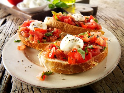 Fresh chopped beefsteak tomato with mini mozzarellas bruschettas