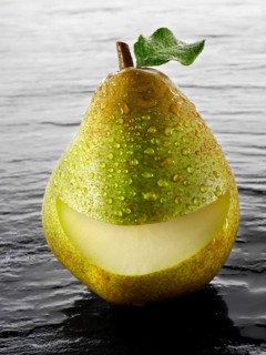 Fresh comice pear with a smile