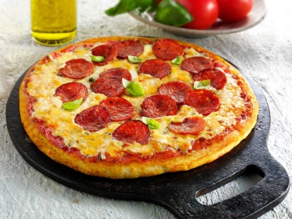 Pizza topped with pepperoni