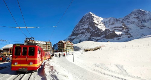 Jungfraujoch train at Kleiner Scheidegg in winter with the mountains Eiger