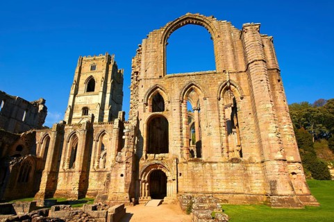 Side chapel wall and bell tower of Fountains Abbey