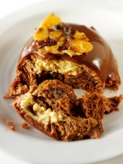 Japanese cake with chocolate and piped chestnut puree with cumquat sauce