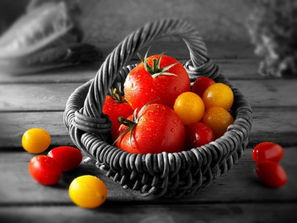 Mixed tomatoes in a basket
