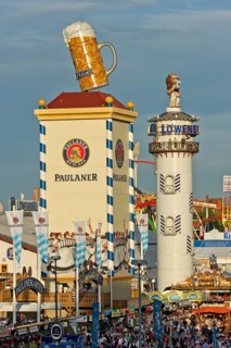 Towers of the marquees of Paulaner Breweries and Lowenbraeu at the Wies'n