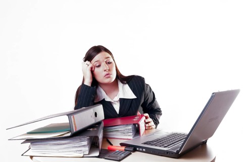 Businesswoman with folders