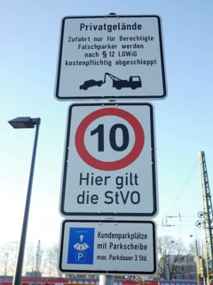 Signs at a parking-access