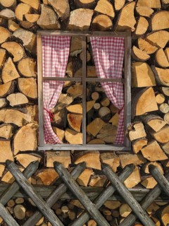 Fake windows in a stack of firewood