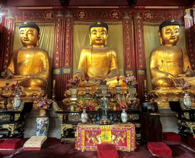 Three Buddha statues