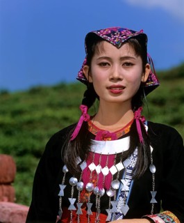 Young Miao woman wearing a traditional ethnic costume