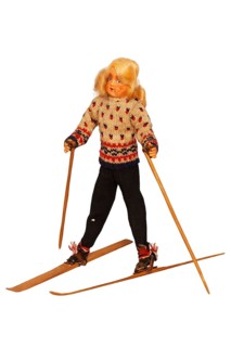 Doll with ski clothing and skis