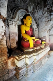 Old Buddha in a temple in Amarapura