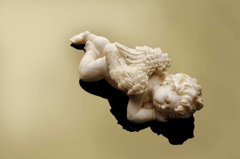 Porcelain angel sleeping