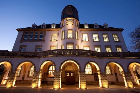 Illuminated Old Town Hall at dusk
