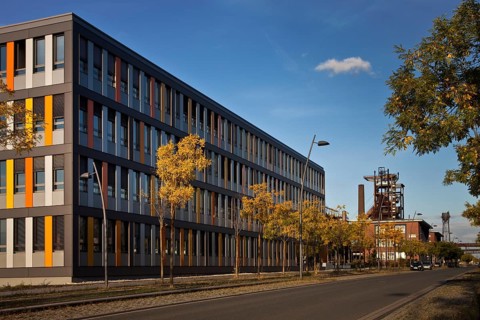 New office building in front of the heritage-protected blast furnace Hochofen 5 from Phoenix West