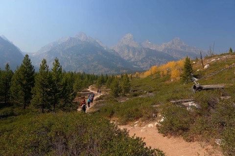 Grand Teton mountain range from the trail to Taggart Lake