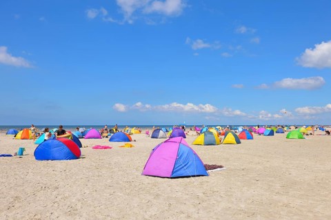 Colorful wind screens on the beach of St. Peter-Ording