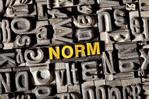 Old lead letters forming the word NORM