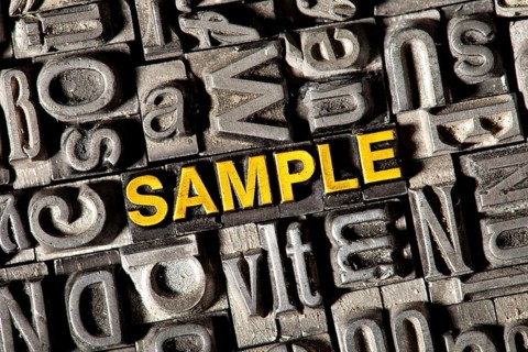 Old lead letters forming the word 'SAMPLE'
